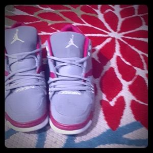 Women's pink and grey Jordans.  Bearly worn.
